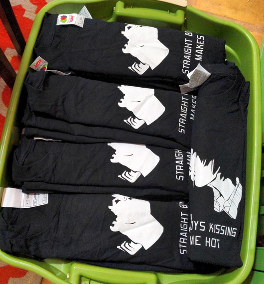 A bucket of recently-discovered t-shirts.